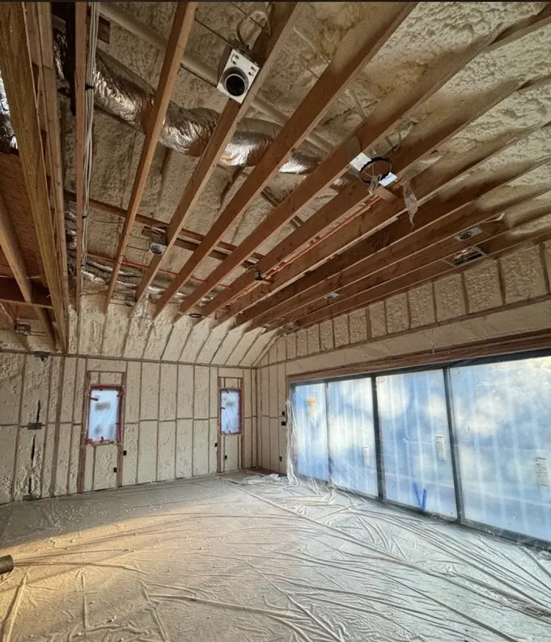 Interior walls and ceiling insulated with spray foam during new construction in Dardenne Prairie